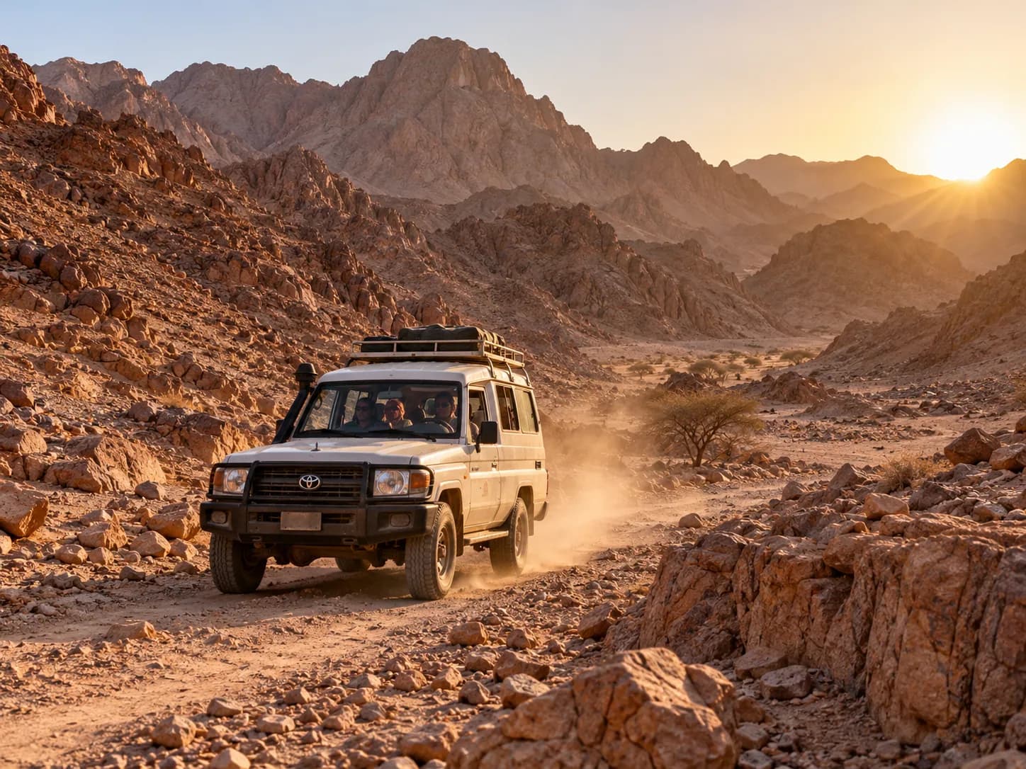 A 4×4 driving up a rocky wadi in the mountains behind Hurghada