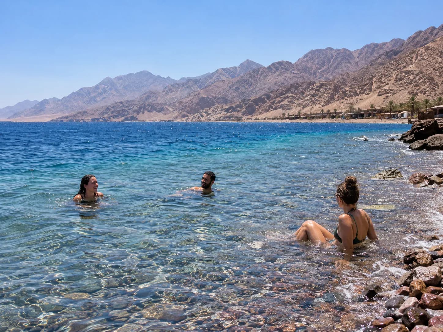 A swim in the clear water on the coast near Dahab